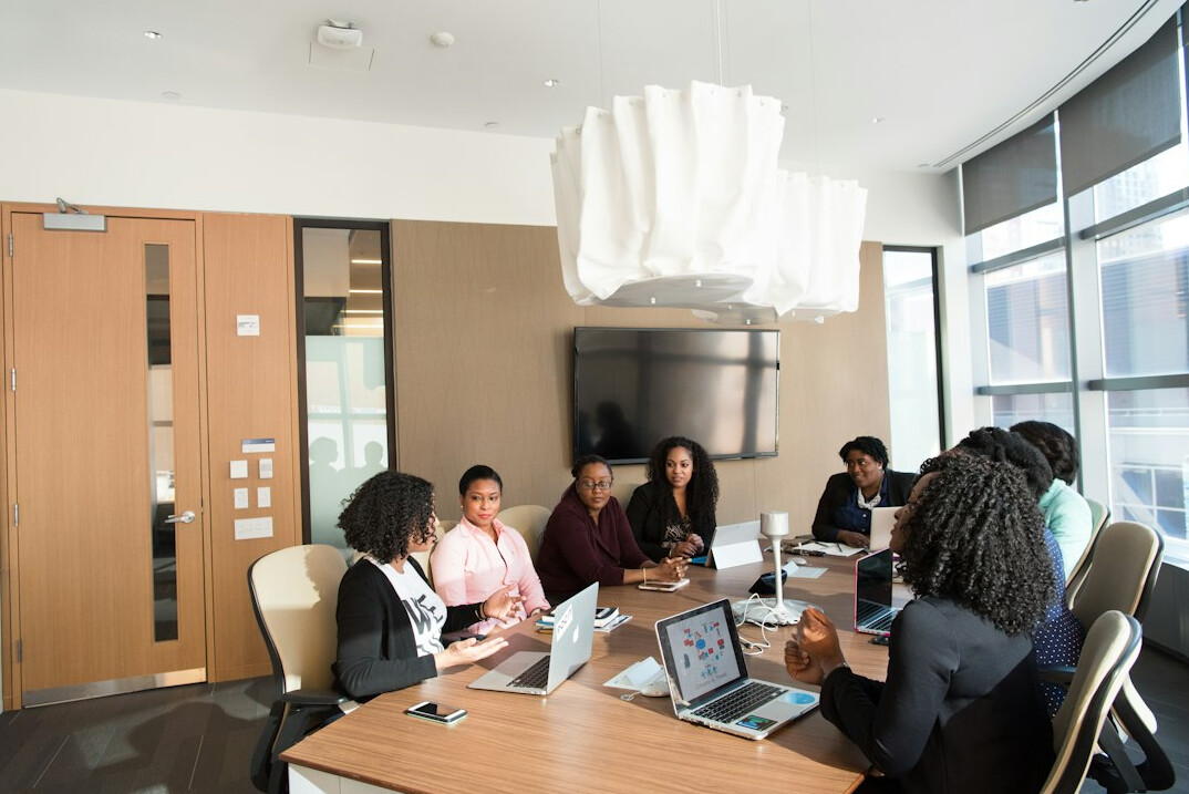 woman leading team discussion